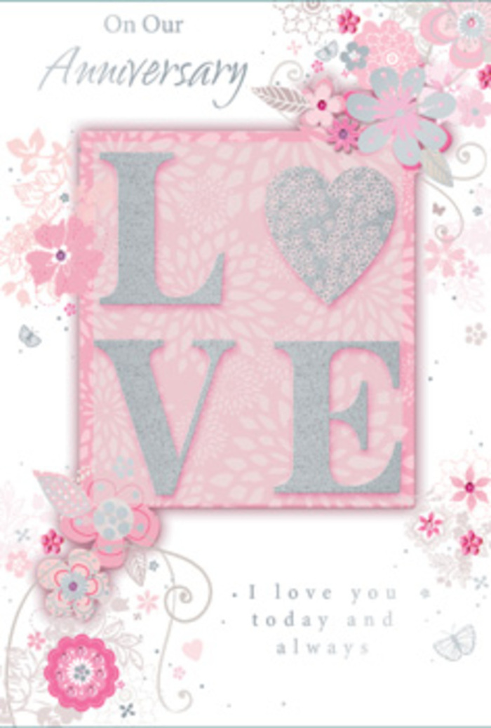 This anniversary card opens like a gentle whisper of affection, the kind of find that feels perfectly suited to a quiet celebration at home in Biggin Hill. The central motif is the word LOVE, rendered in an elegant, frosted glitter print that rises lightly from the card's surface, inviting fingers to trace each letter. The sparkle is soft rather than bold, giving the impression of light catching fresh dew on petals at first morning in the hills. Around this centrepiece, wispy, hand-drawn blooms and soft sprays spill along the borders, their shades of blush pink, lilac, ivory, and pearly white blending as smoothly as flowers arranged by an experienced florist. The blossoms and leaves appear almost weightless, with fine, flowing lines and delicate shading that hint at depth without becoming overwhelming. Subtle flourishes-filigree curves, dainty leaves, and near-hidden butterflies-peek between the petals, suggesting the shy flutter of hearts on another shared anniversary. The lighting on the card feels gentle and even, emphasising the softness of the pastel tones and the smooth card stock, with the raised glitter adding just enough texture to catch the eye. Nestled beneath or beside the floral motif, a simple message reads, I love you today and always, set in understated, graceful type. Its calm presence supports rather than competes with the artwork, as if quietly spoken over a candlelit dinner. The whole piece feels like a hand-tied bouquet translated into paper-a thoughtful, tender expression of gratitude and enduring love that could easily be chosen by someone in Biggin Hill wanting to mark another meaningful year together.